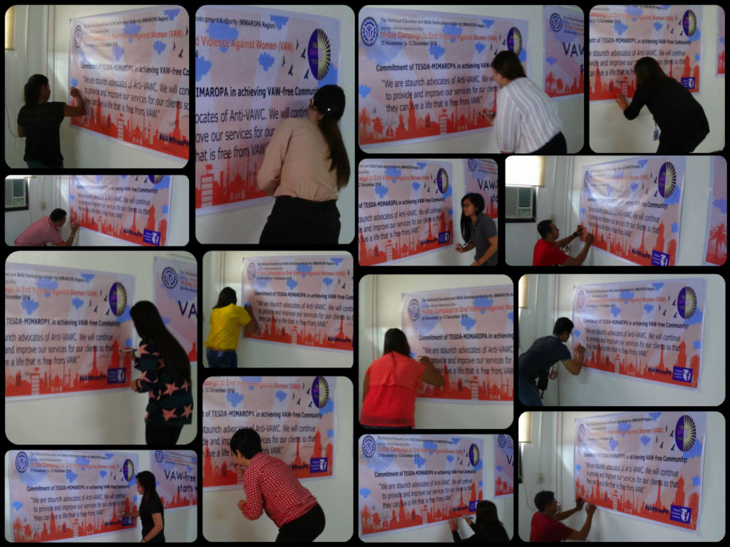 TESDA-MIMAROPA Staff signing the Pledge of Commitment to Anti-VAW